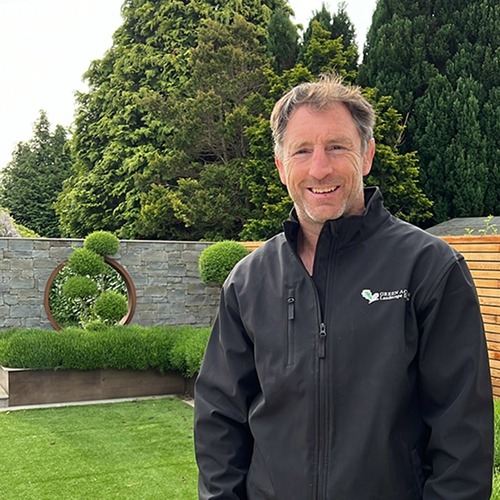 Greg Jacob, founder of Green Acorn, in a client garden